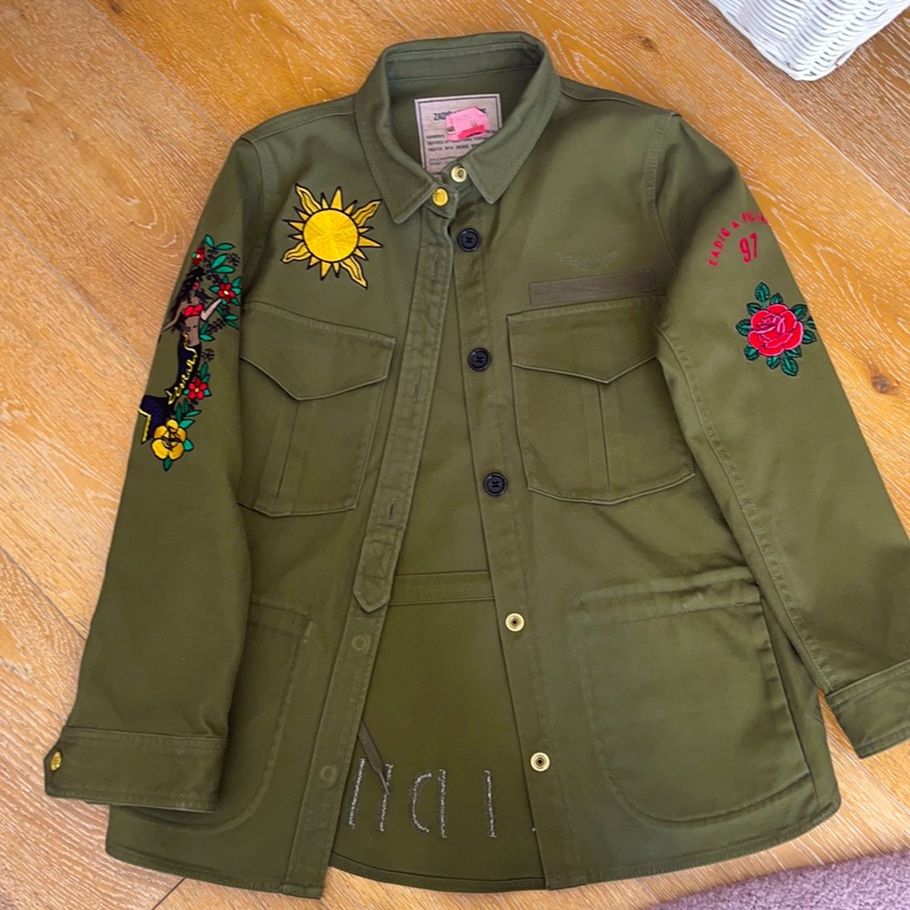 Brand is Zadig and Voltaire. It is a dark army green jacket. Perfect condition.